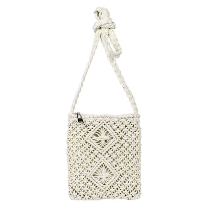 Handcrafted white macramé shoulder bag with intricate geometric patterns and a twisted rope strap.